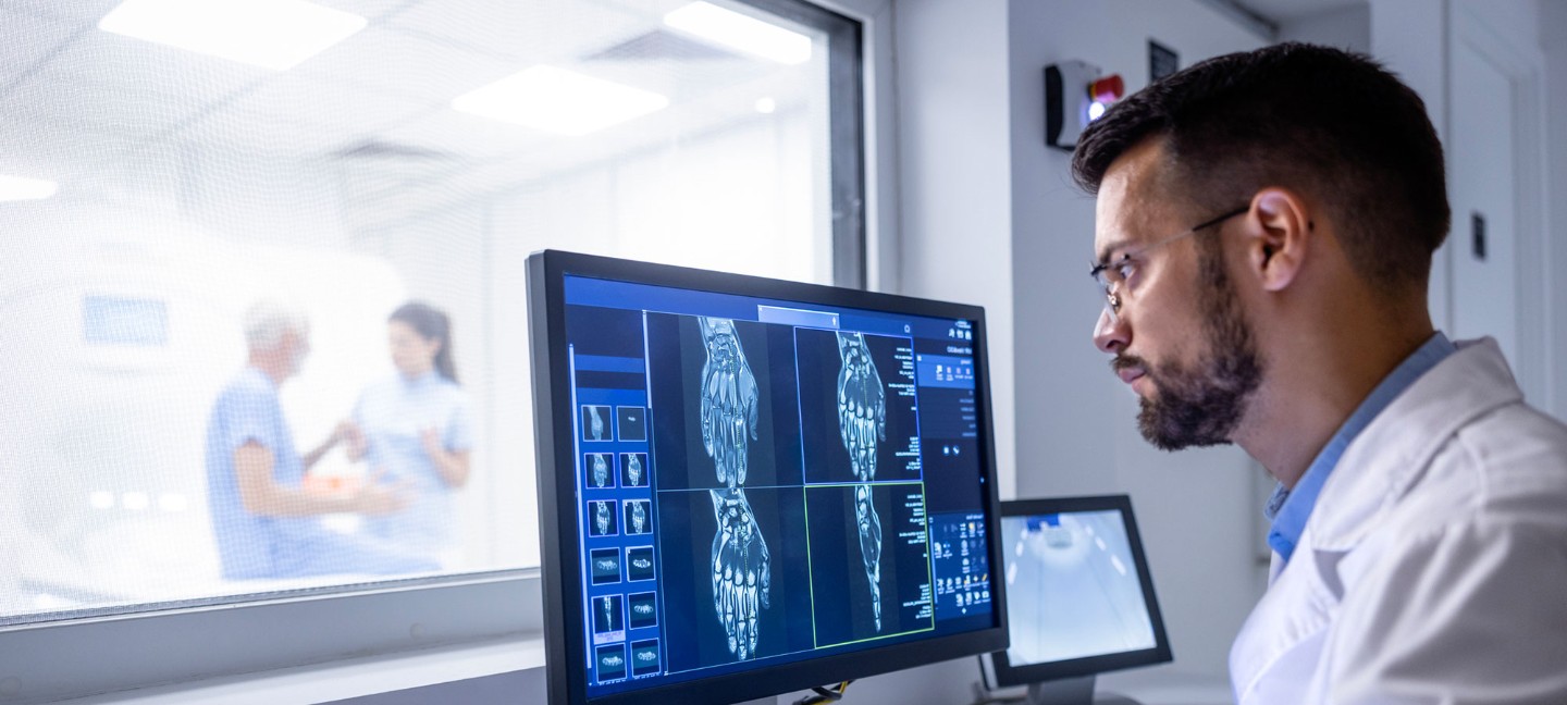 Examining x-ray images in control room